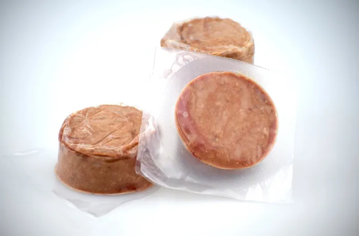 Tucker's Raw Beef & Pumpkin frozen patties close-up